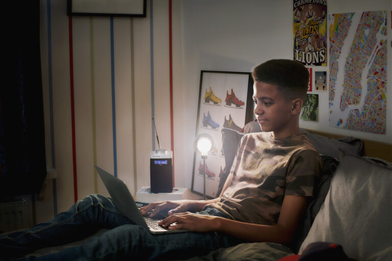 PHOTOGRAPHY-Teenager-on-laptop-Radio